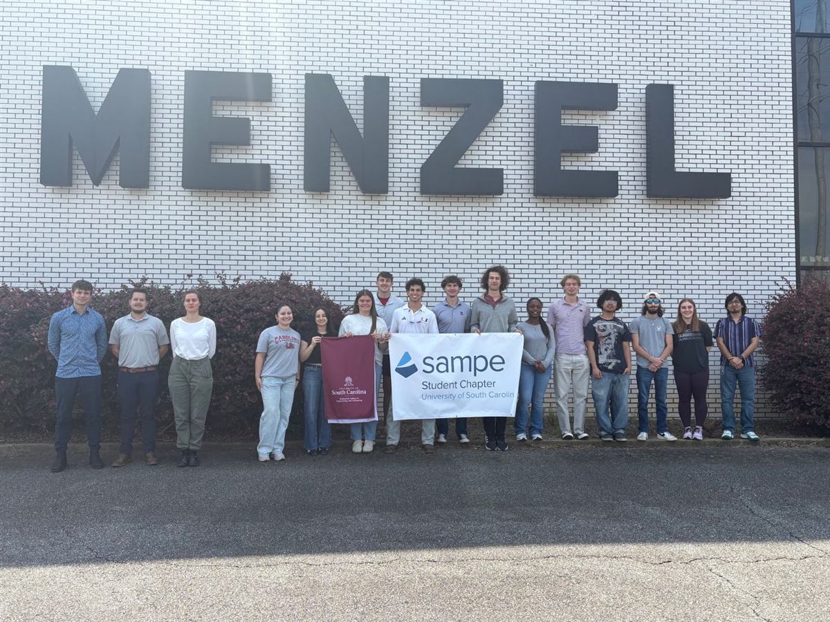 SAMPE chapter with banner outside the Menzel building
